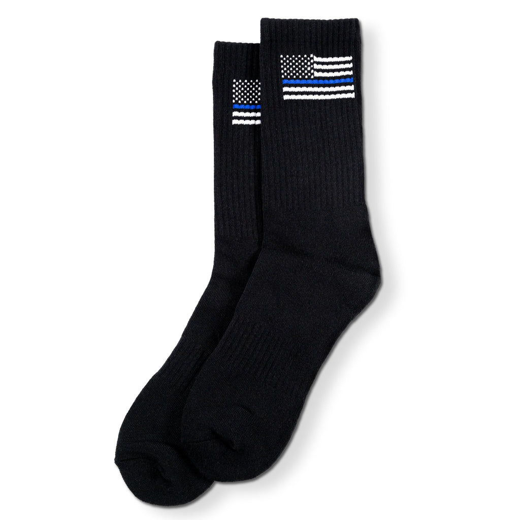 Black socks with thin blue flag design on a white background